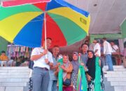 Dukung UMKM, BRI Unit II Pangkalpinang Salurkan 30 Payung untuk Pedagang Pasar Pagi Kampung Melayu