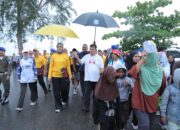 Meski Diguyur Hujan, Antusiasme Warga Tinggi di Pasir Padi Beach Festival 2025